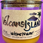 Recycled glass bottle candle in amber wax with Volcano Island WicksNWax label