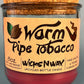 Recycled glass jar candle with printed label, cork lid, red wax
