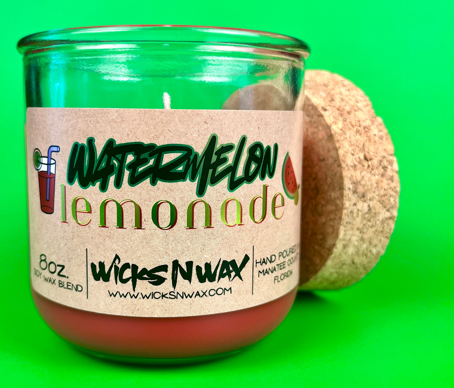 Recycled glass candle jar with red wax, watermelon lemonade label, cork coaster