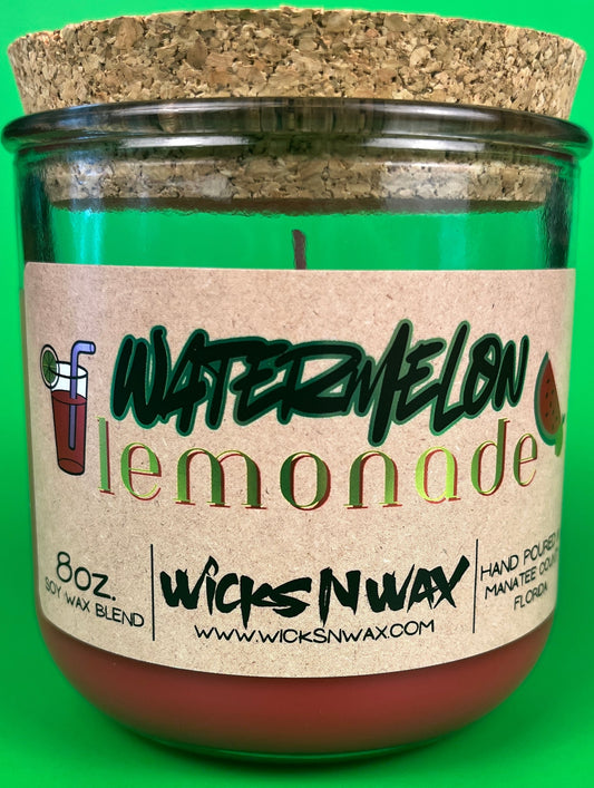 Recycled glass candle jar with brown wax and visible center wick, Watermelon Lemonade label