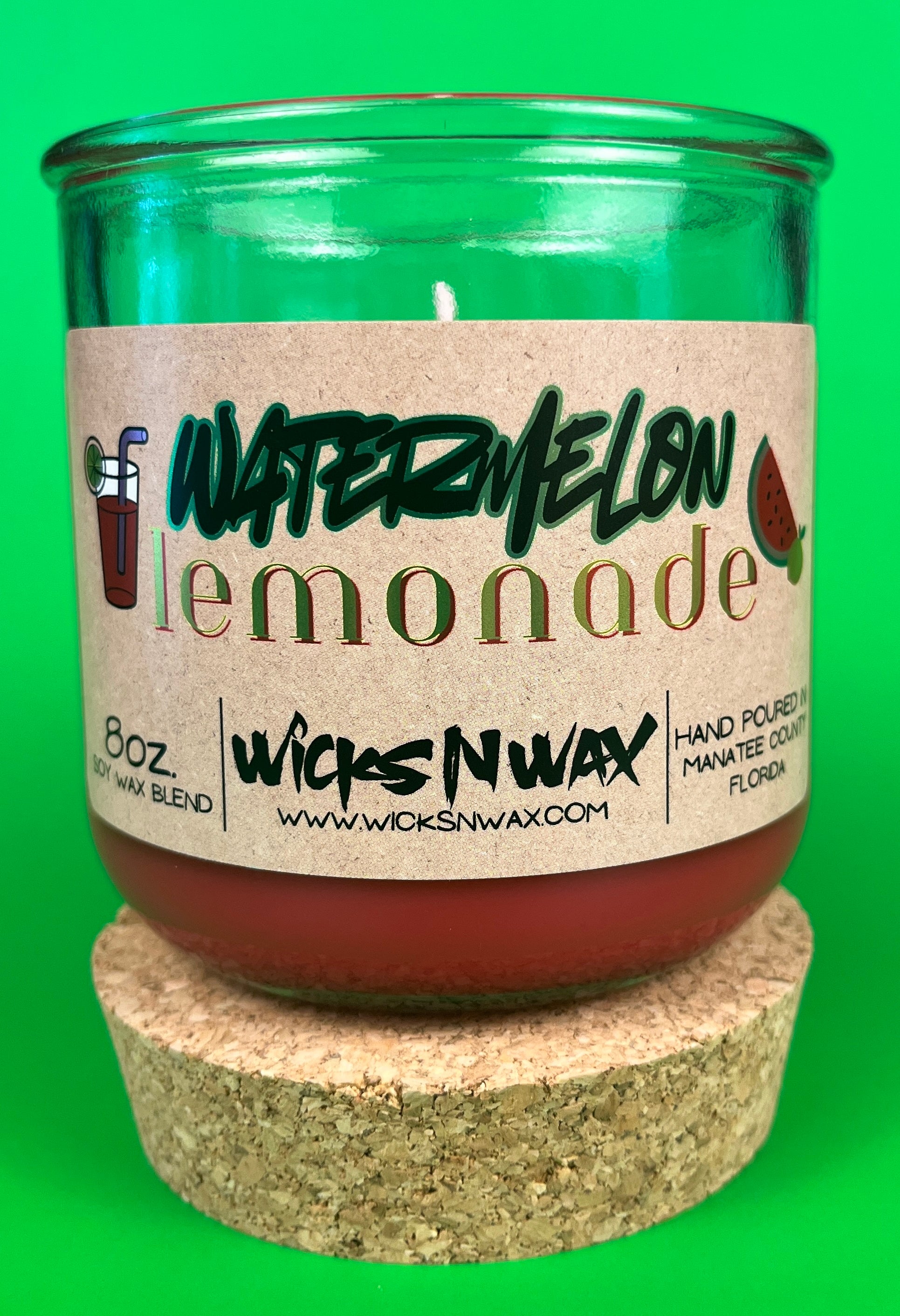 Recycled glass candle jar with red wax, watermelon lemonade label, on cork base
