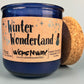 Blue glass candle with cork and side label, jar and lid shown