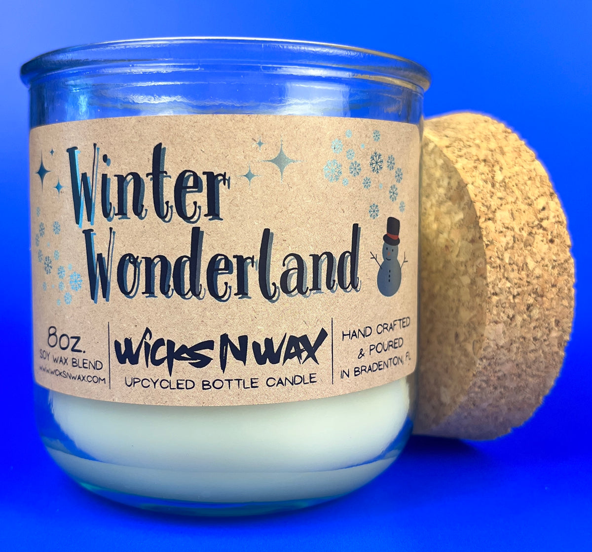 Recycled glass candle with cork base, Winter Wonderland label and snowman graphic